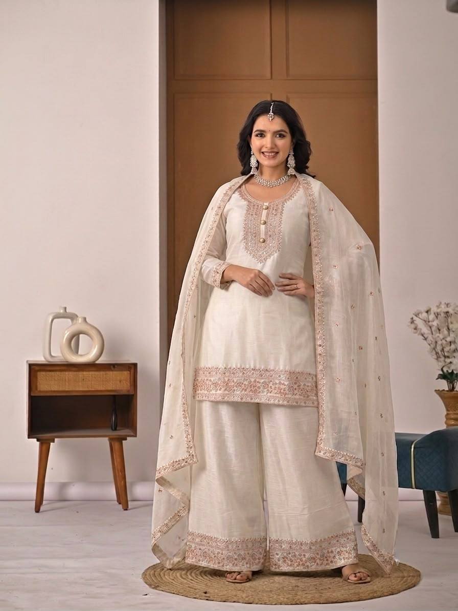 Pristine Ivory White Kurta and Palazzo Set Featuring Delicate Floral Embroidery, Sequined Borders, and a Matching Sheer Dupatta